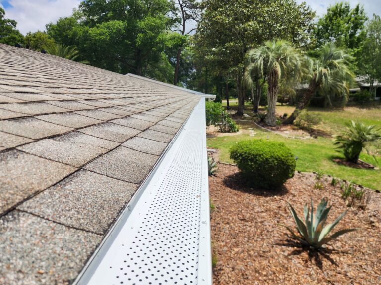 Premium Leaf Guards micro-mesh leaf guard installed along a seamless aluminum gutter on an Ocala, Florida home